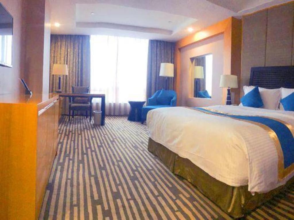 Grand Mercure Teda Далянь Экстерьер фото